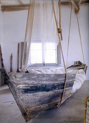 http://reclaimedhome.com/wp-content/uploads/2013/04/upcycled-boat-bed.jpg
